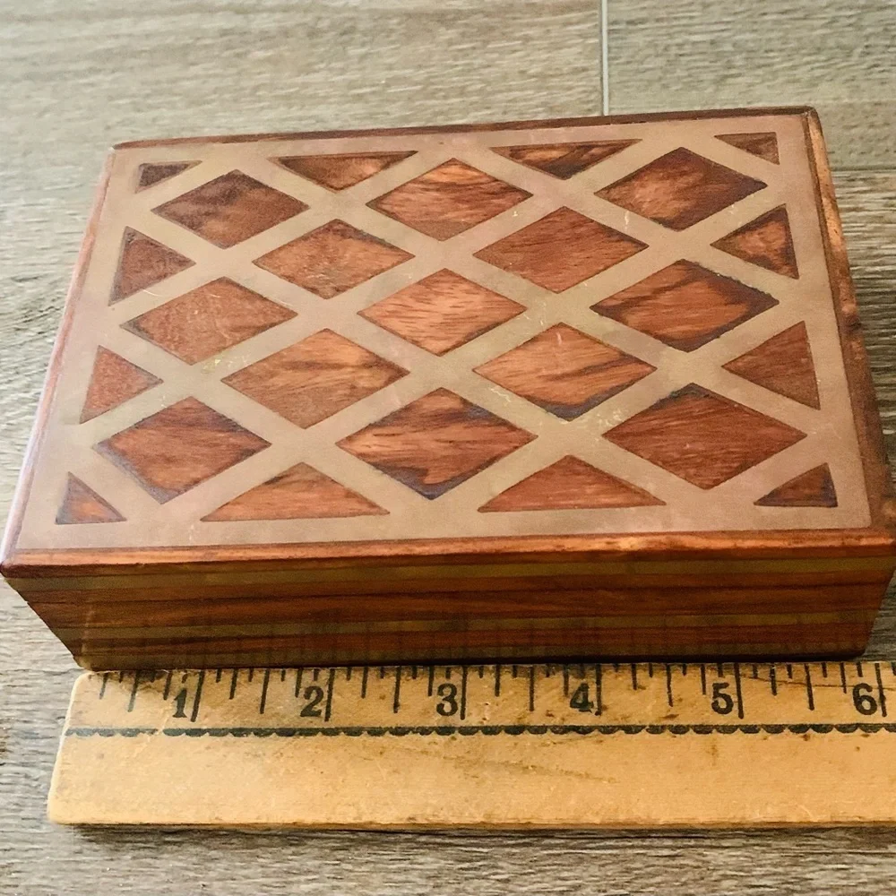 vintage wooden box with metal file